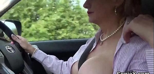  Adulterous english mature lady sonia flashes her huge tits